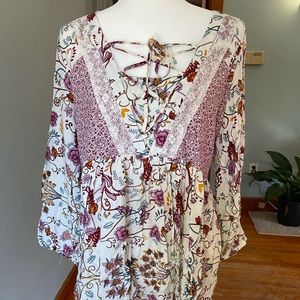 Floral peasant top with criss cross lace up